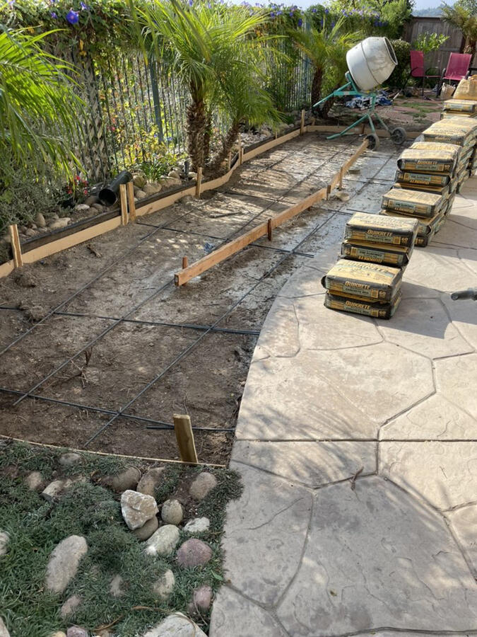 Concrete add on connected , getting it ready for wood plank tiles