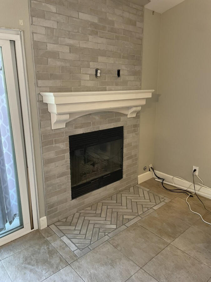 Fireplace brick lay / hearth herringbone and hung mantle